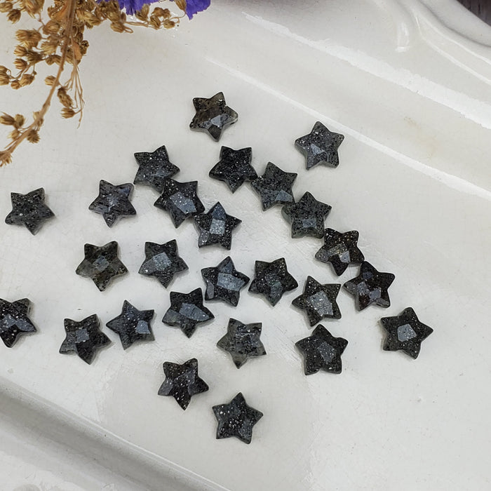 Faceted Black Sunstone Stars, drilled 10mm