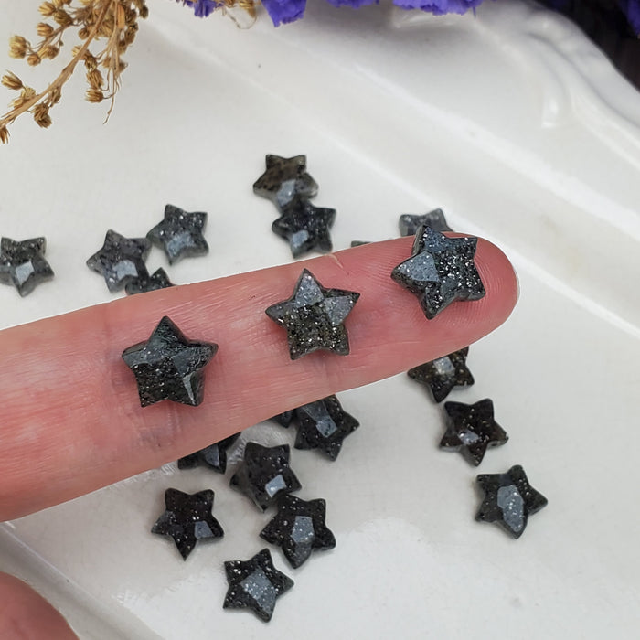 Faceted Black Sunstone Stars, drilled 10mm