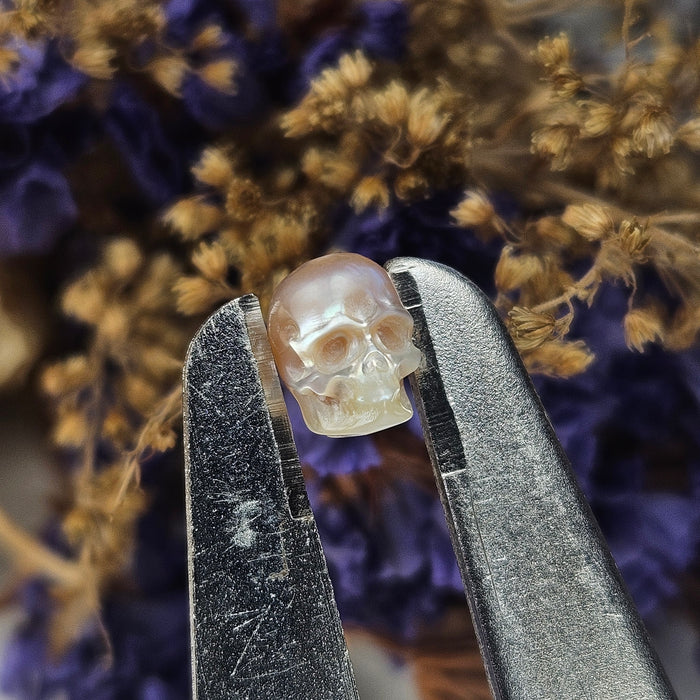 Carved Pearl Skulls