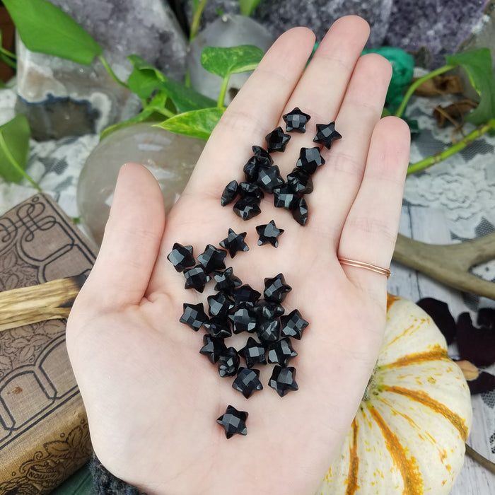 Faceted Black Onyx Stars, drilled, 10mm