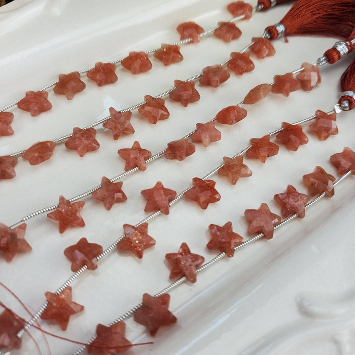 Sunstone Faceted Stars, drilled 10mm