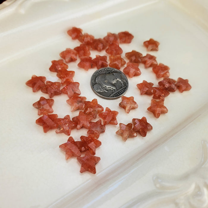 Sunstone Faceted Stars, drilled 10mm