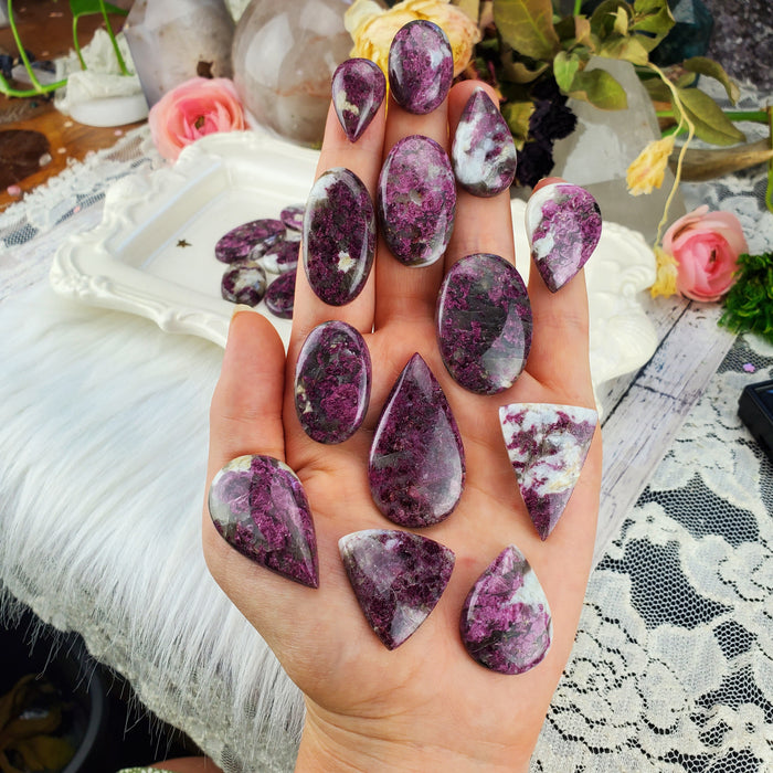 Rubellite in Quartz Cabochons