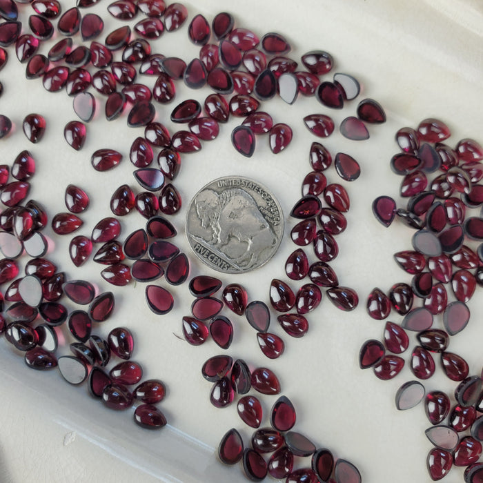 Garnet Cabochons, 5x7mm Teardrop