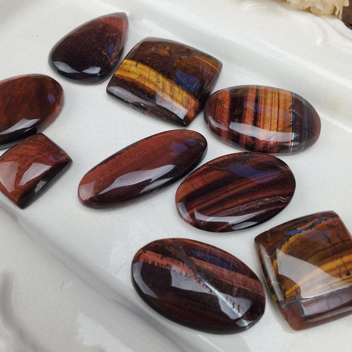 Red Tigers Eye Cabochons, 100 gram bags