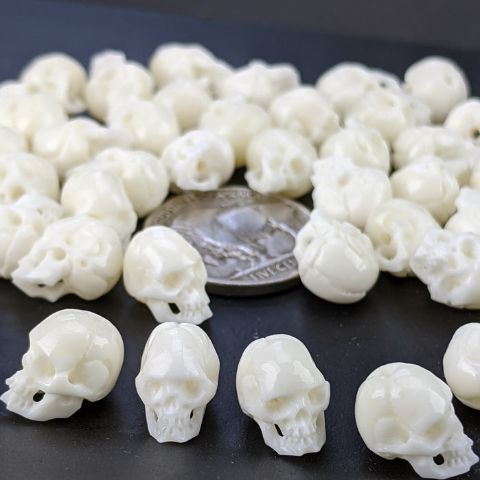 Bone Carved Fairy Skull, drilled, tiny